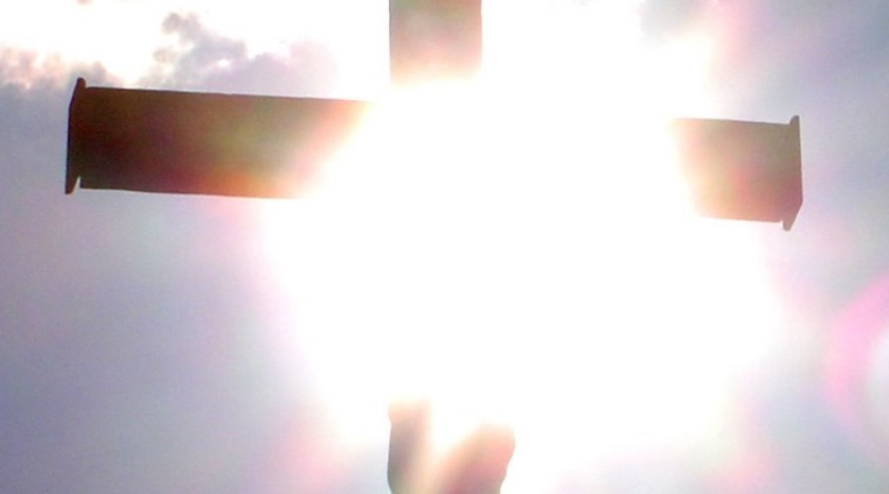 Cross in sun
